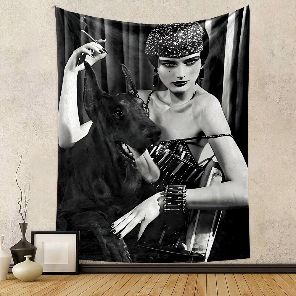A woman with a glamorous appearance holds a black dog in an elegant pose. Patterned tapestry for bedroom and living room home decor