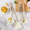 4-Piece Silicone Cooking Set: Spatula, Food Clip, Soup Spoon, Non-Stick. Perfect for Household Kitchenware.
