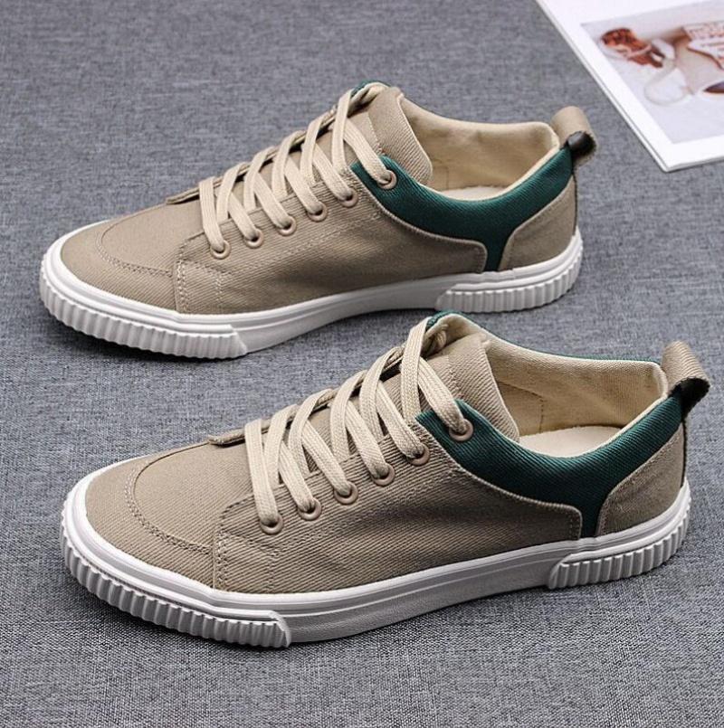 Fashion Men's Spring Canvas Shoes New Breathable Lace Up Casual Men's Versatile Flat Bottomed Cloth Shoes Anti Skateboard Shoes Tenis
