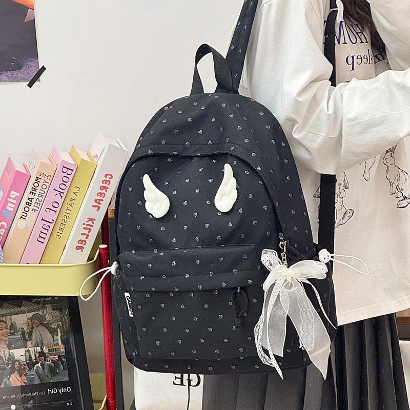 Schoolbag Korean version polka dot cute niche design casual sweet small backpack Mori small fresh junior high school girls backpack