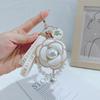Korean Pearl Camellia Keychain: Stylish Bag & Car Accessory for Women