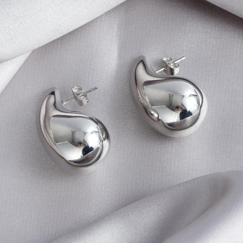 European and American show retro comma teardrop punk style earrings, simple glossy hanging water drop earrings