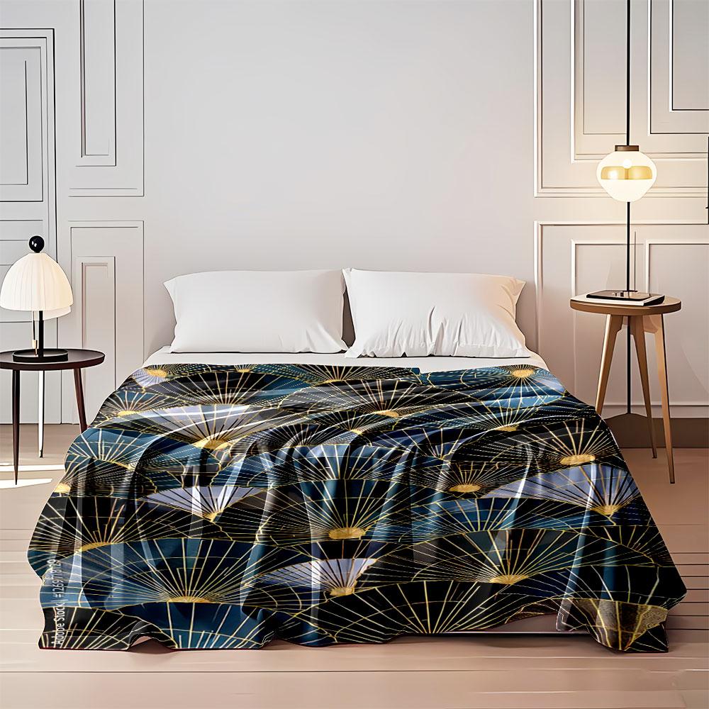 Overlapping fan shapes with gold lines and gradients of blue and black. for all seasons blanket lunch break throw gift