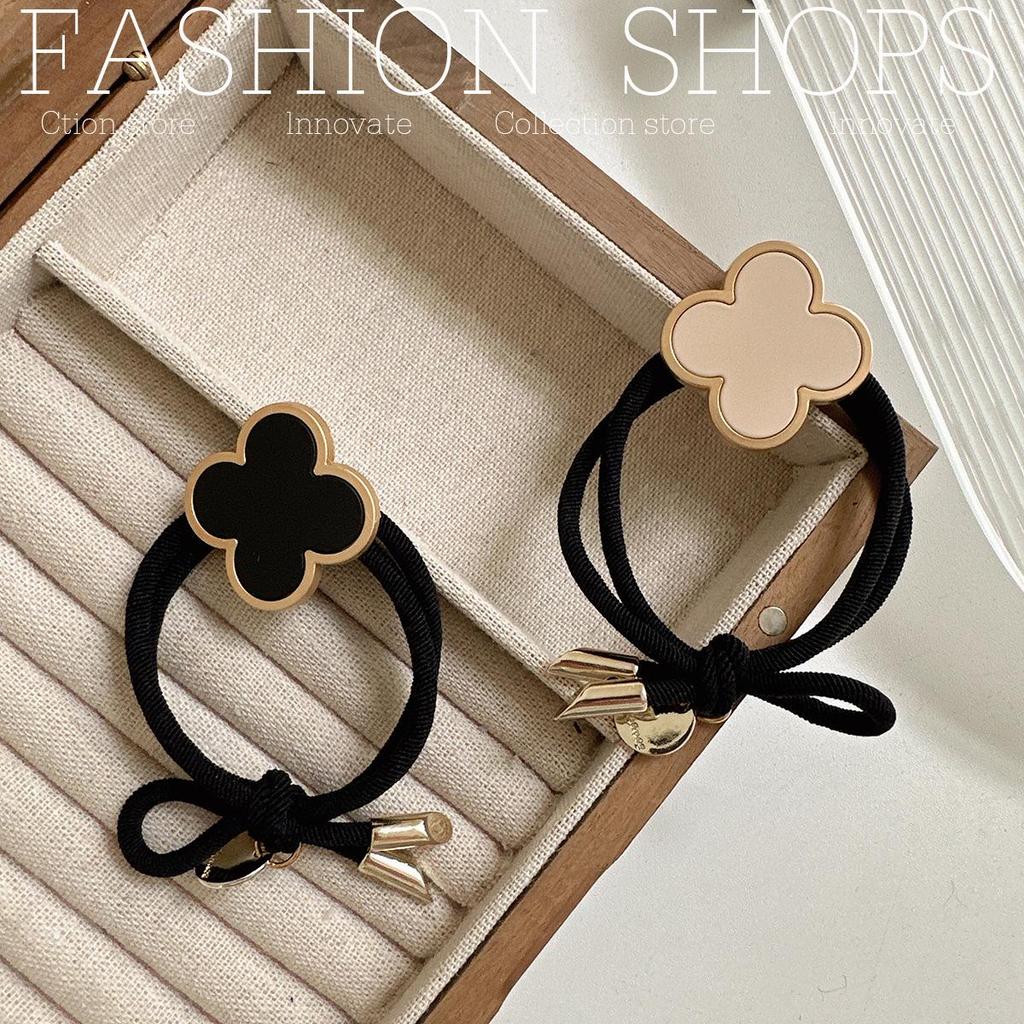 Korean High-End Four-Leaf Clover Hair Tie for Women - Non-Tightening Summer Ponytail Accessory with Black Leather Case