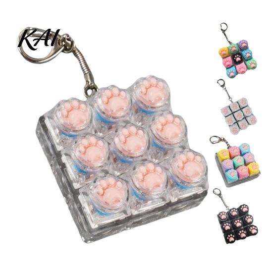 Desk Stress Buster Cat Paw Keyboard Fidget Toy 9-in-1 LED Light-up Keychain Decompression Travel Gadget Button Finger Clicker Work Relief