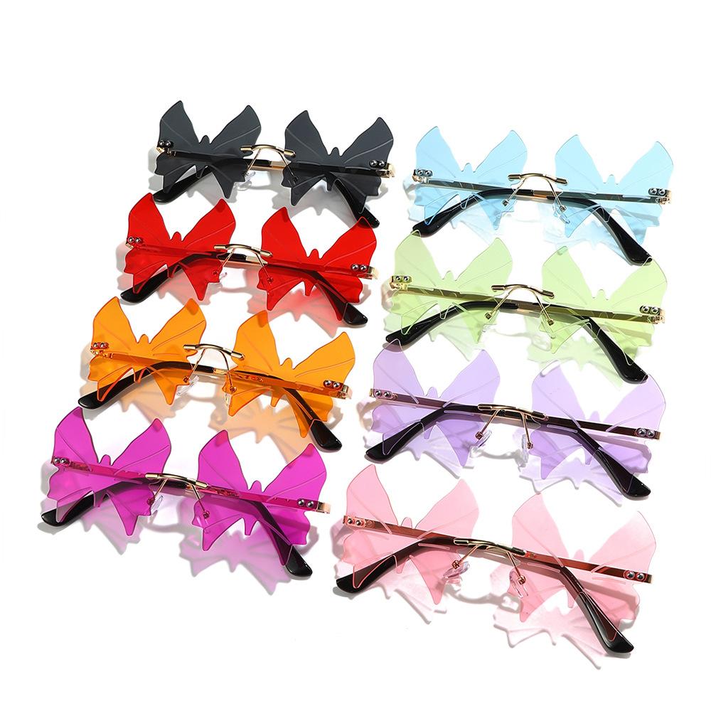 Frameless sunglasses, European and American personalized women's fashion butterfly irregular hip hop ins sunglasses