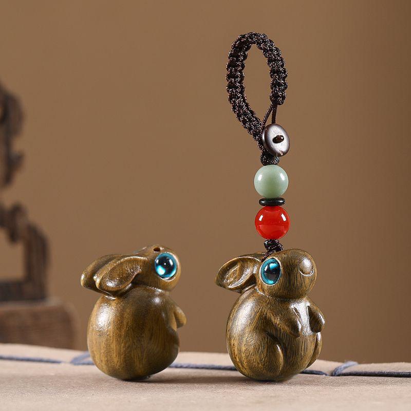 Twelve Zodiac Animal Charms Green Sandalwood Set: Rat, Ox, Tiger, Rabbit, Dragon, Snake, Horse, Sheep, Monkey, Rooster, Dog, Pig.