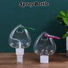 Refillable Alcohol Travel Empty Container Bottle Leaf Heart Spray Bottle Lotion Jar With Metal Hook