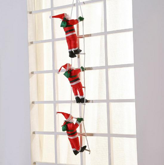 Трансграничный подвесной Санта-Клаус, карабкающийся по лестнице, со спонжем, доступен в вариантах с одним, двумя или тремя персонажами.