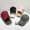 The new fashionable baseball cap is a versatile accessory for women in spring and summer. It features a large brim, which not only provides sun