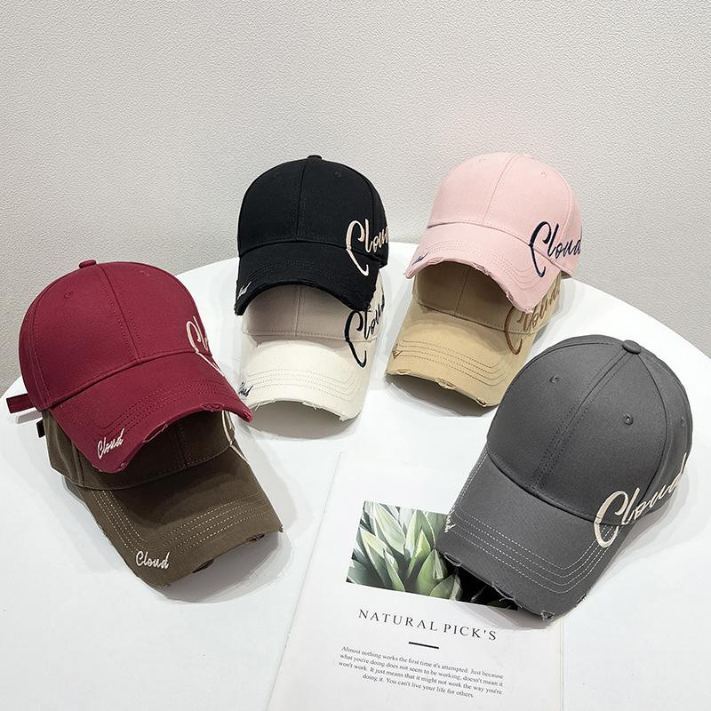 The new fashionable baseball cap is a versatile accessory for women in spring and summer. It features a large brim, which not only provides sun