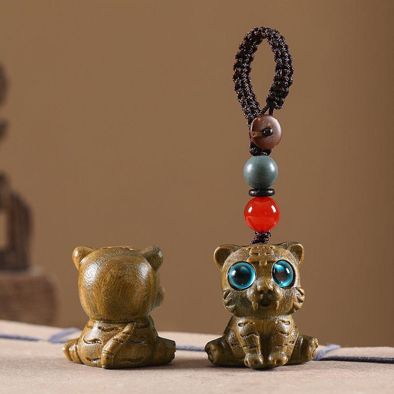 Twelve Zodiac Animal Charms Green Sandalwood Set: Rat, Ox, Tiger, Rabbit, Dragon, Snake, Horse, Sheep, Monkey, Rooster, Dog, Pig.