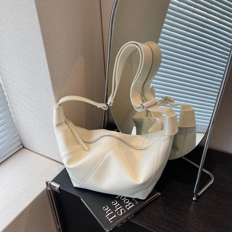 Сумка большой вместимости женская новая простая и универсальная на плечо, сумка-мессенджер, нишевый дизайн, сумка-пельмень для поездок на работу