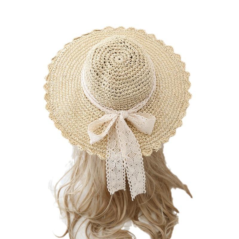 Small fresh and versatile lace strap bow hat women's summer outing big eaves beach hat scenic straw hat