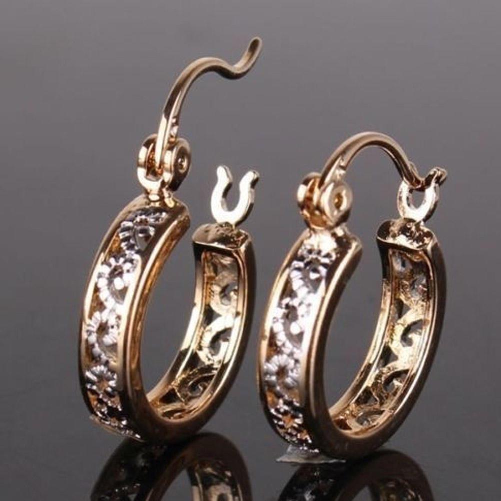 Роскошные женские серьги из сплава золотого цвета с ажурным узором