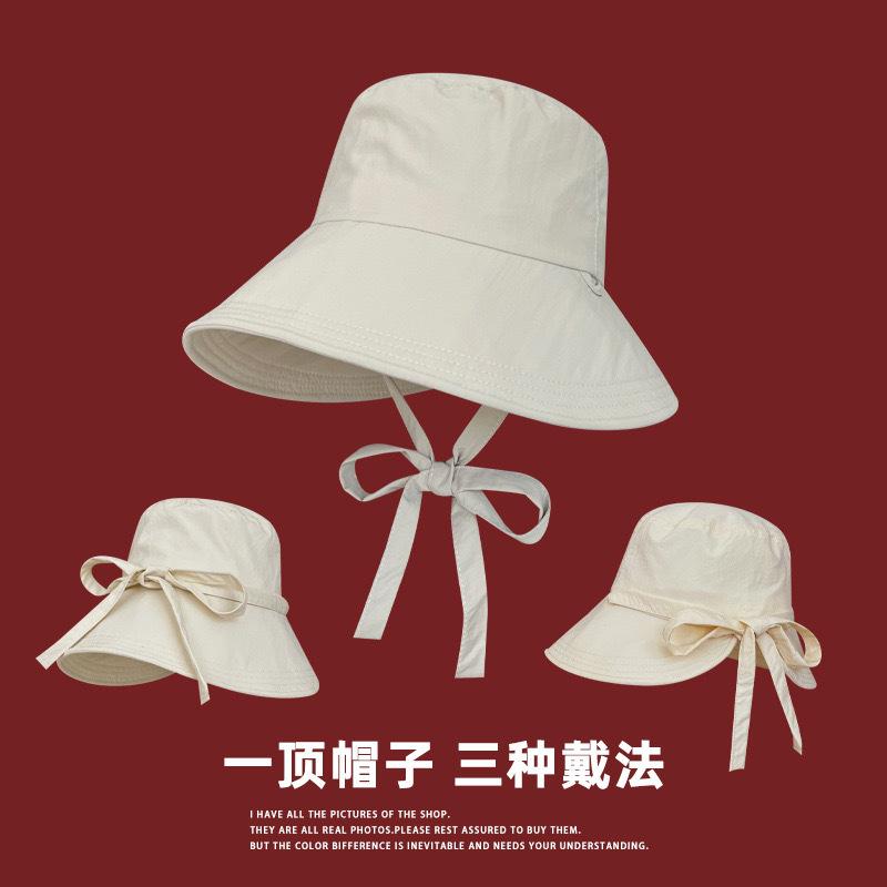 Big brim bow sunshade bucket hat women's summer temperament show face small straps beach sunscreen sun hat