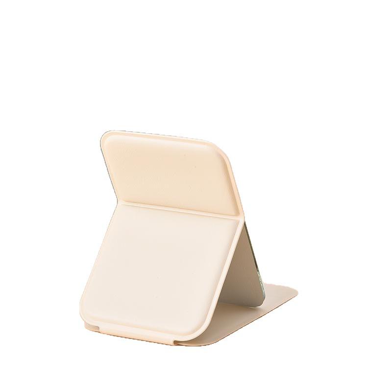 Compact Folding Travel Makeup Mirror - Portable, Handheld & Perfect for Student Dorms or Pocket Use.