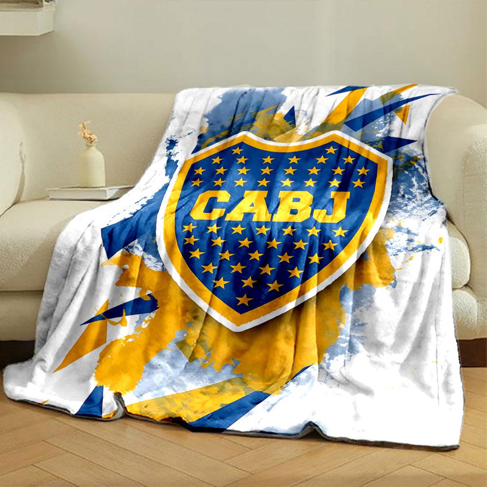 Blue and yellow shield with stars, splattered background, angular shapes. for all seasons blanket lunch break throw gift