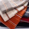 Autumn and winter new cashmere striped knitted headgear men's and women's casual warm ear protection hat showing a small cold hat