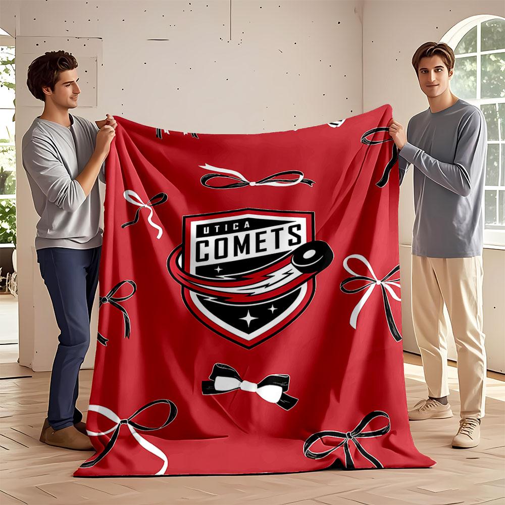 Red background with a shield logo and black and white ribbon patterns. for all seasons blanket lunch break throw gift