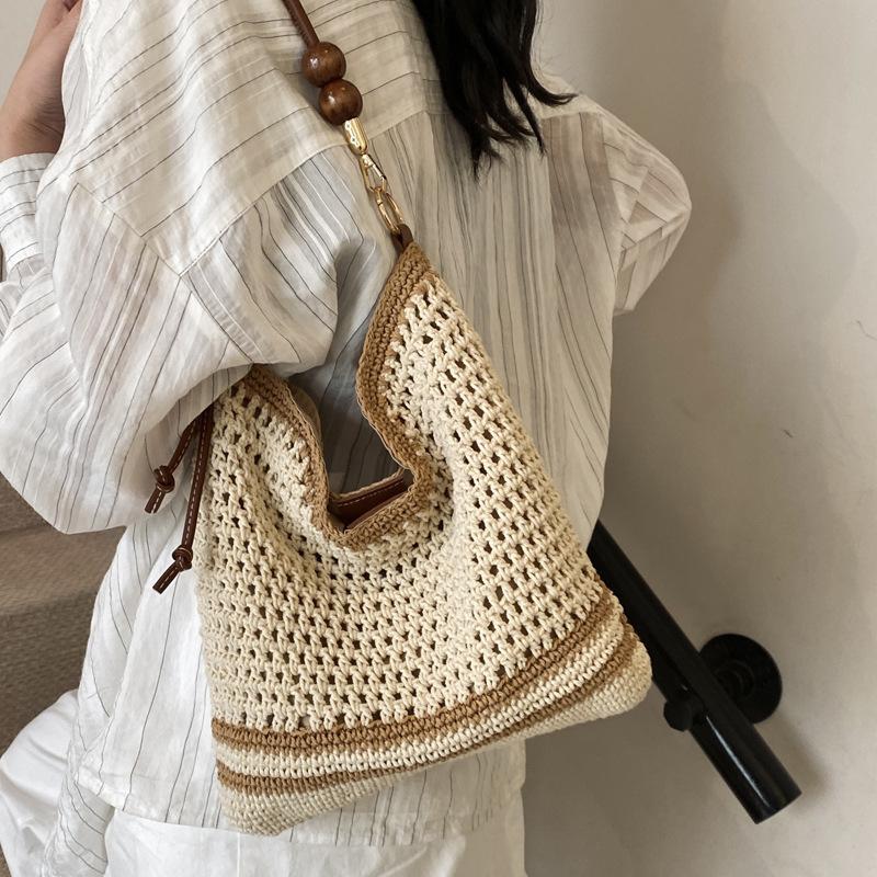 Женская сумка-тоут 2025 новая большой вместимости для поездок на работу для студентов колледжа на занятия плетеная мягкая полая пляжная на плечо