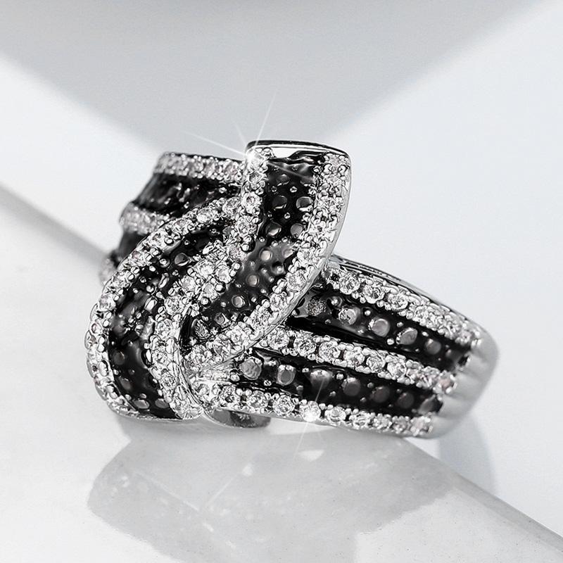 Кольцо Huitan Personality Black Enamel Knot Ring для женщин, новое современное дизайнерское шикарное женское кольцо на палец, вечерние украшения с фианитами