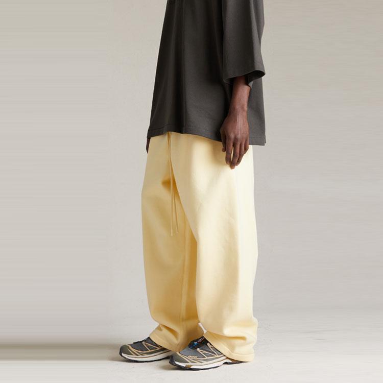 Fear of God Essentials Свободные брюки Садовый желтый Мужские брюки 130SP244321F