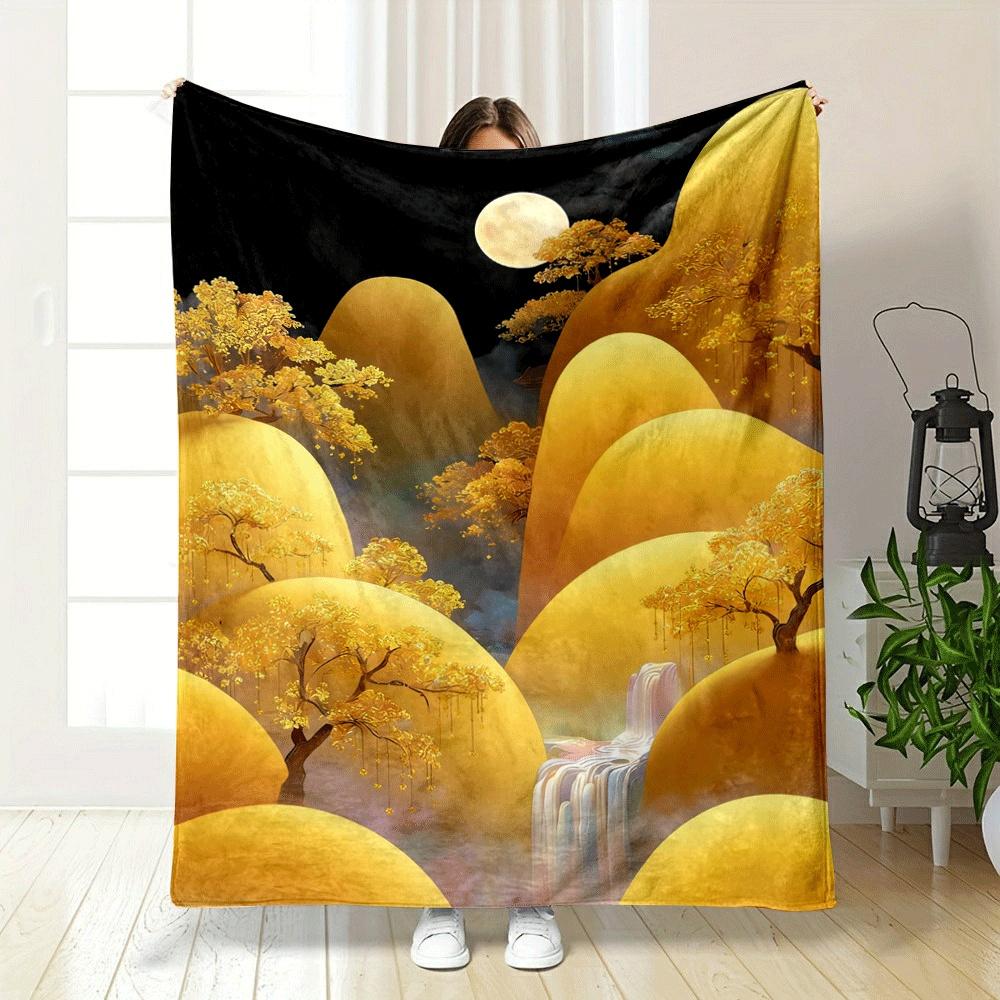 Golden trees and flowing white waterfall among soft glowing yellow hills. for all seasons blanket lunch break throw gift
