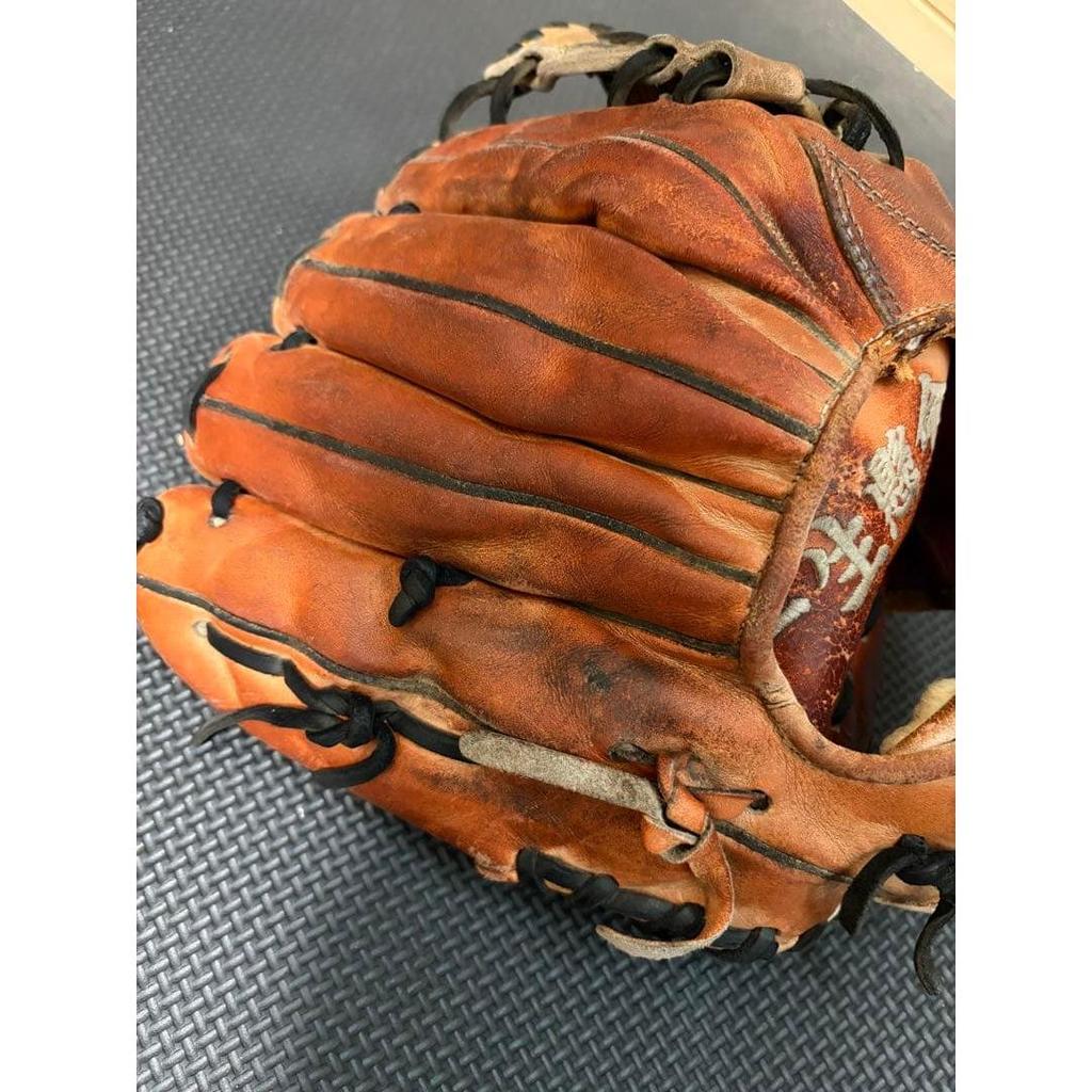 Б/у жесткая перчатка Kubota Slugger