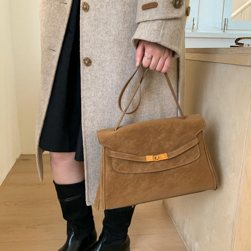 Винтажная матовая сумка 2025 новая высококлассная женская сумка через плечо и мессенджер для通勤, большая вместительная рабочая сумка-тоут