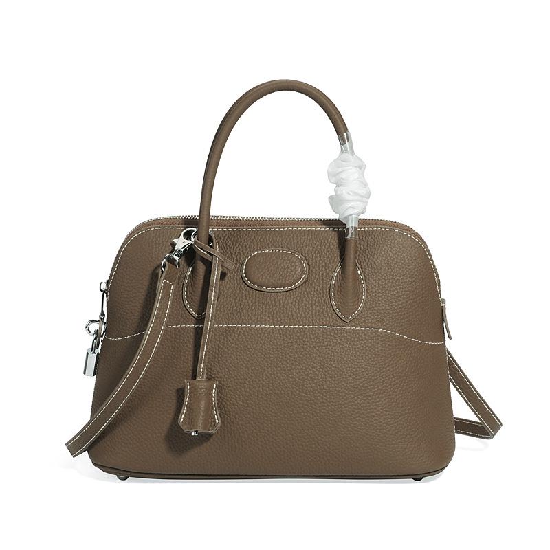 Новая женская сумка из натуральной кожи с узором личи 2024 года - европейский и американский модный дизайн в виде ракушки