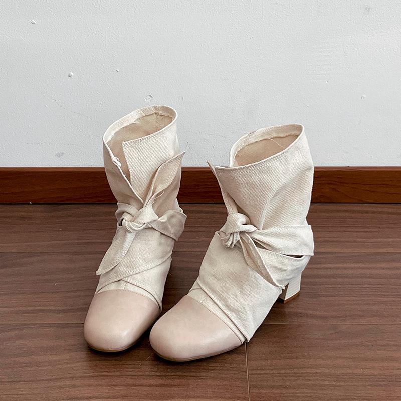 Retro niche strap short boots women's new autumn and winter new versatile thick heel small man height increase and thin short boots