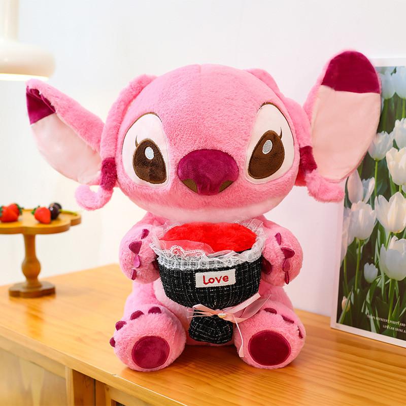 Blue Stitch And Pink Plush Dolls With Embracing Flower Design For Gift Giving