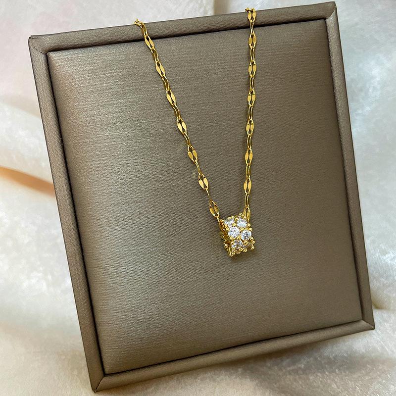 Позолоченная медь 18 карат, цепочка на ключицу с дизайном абака, тыквы-горлянки и лебедя.