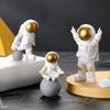 4 статуэтки космонавтов, модель, смоляное украшение, полка шкафа, книжная полка, камин, фигурка космонавта, скульптура