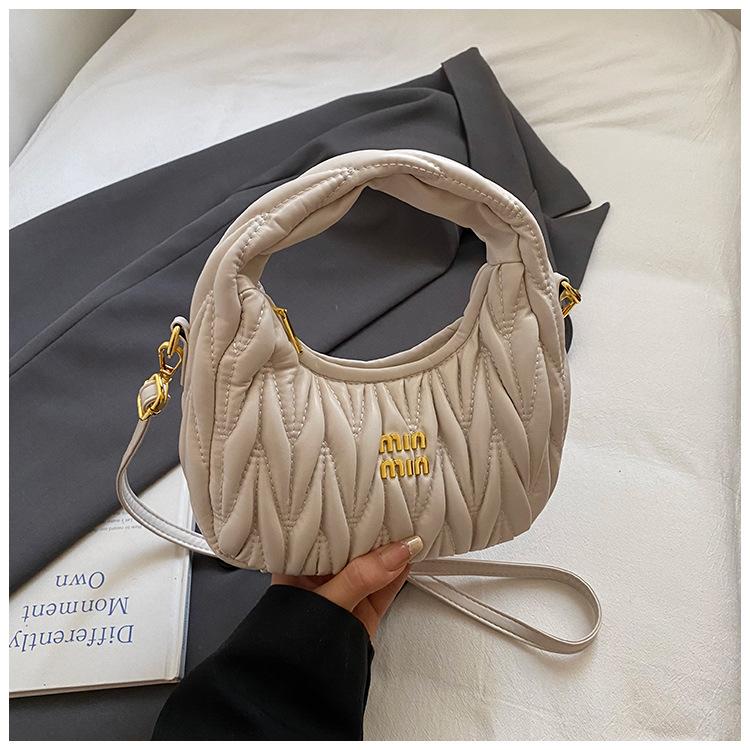 Niche crescent moon bag women's 2025 new commuter handheld underarm bag shoulder crescent bag premium messenger bag tide