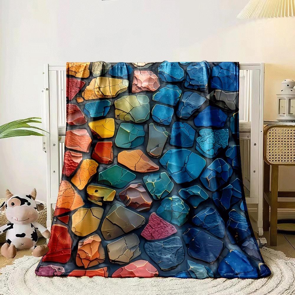 Colorful cracked stone-like shapes arranged in a mosaic-like pattern. for all seasons blanket lunch break throw gift