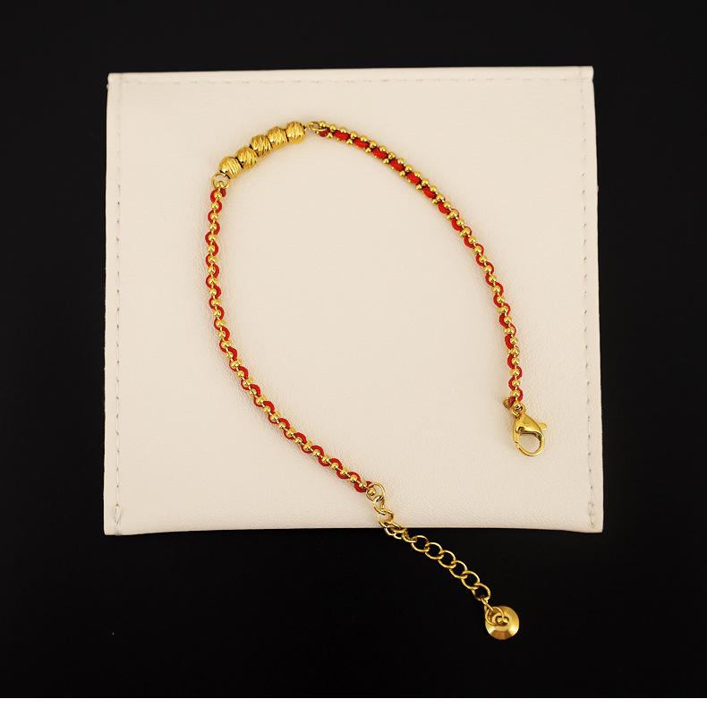 Новогодний красный браслет ручной работы для женщин с золотыми бусинами - подарок от Tai Sui.