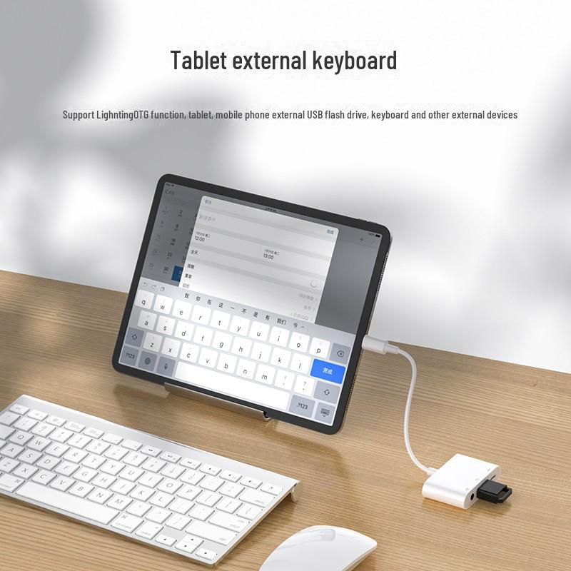 OTG Adapter: Charge & Listen - Lightning, USB, and 3.5mm Audio Converter by Biaz