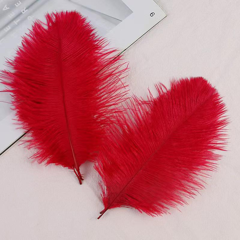 Большие страусиные перья 15-20 см для свадебных композиций и сценического реквизита