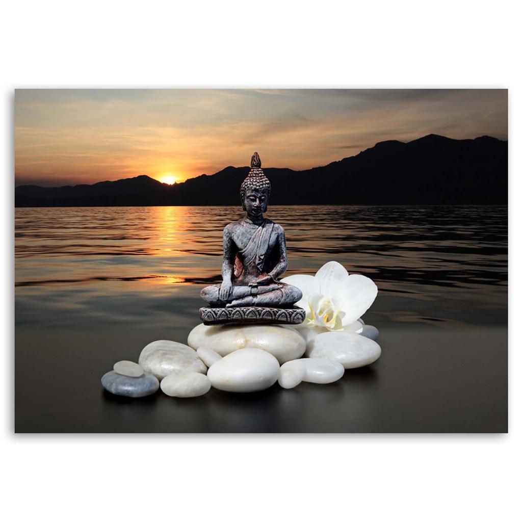 Canvas print, Buddha on a background of a setting sun