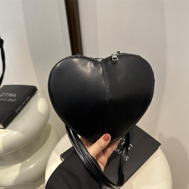 Модная простая и модная однотонная маленькая сумка для женщин на весну, новая красивая фактура, сумка через плечо в форме сердца для женщин