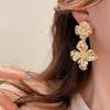 2024 High-End Golden Metal Flower Earrings: Unique Celebrity-Inspired Design with Elegant Flair for Women