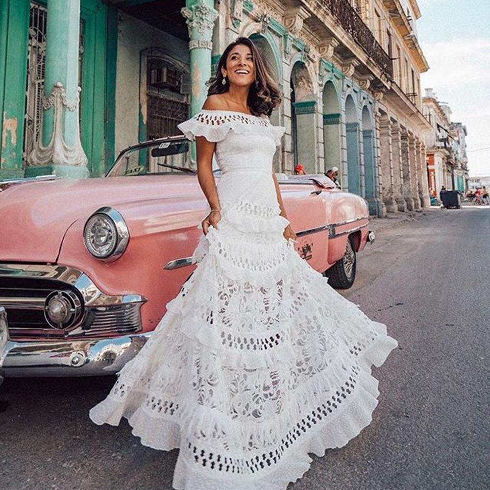 2025 spring and summer new European and American women's clothing wish one-word shoulder ruffle edge hollow white pendulum lace dress