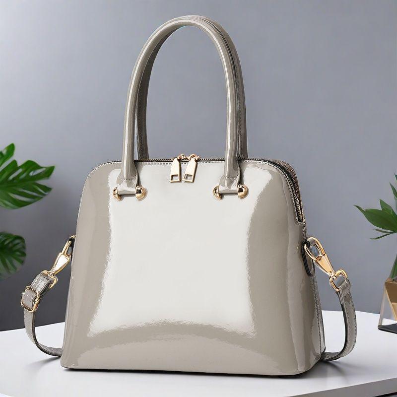 Женская лаковая сумка-тоут 2025: Универсальная европейская и американская модная сумка, ручная, на плечо или через плечо, красного и черного цвета.