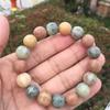Green Bodhi Root & Ivory Nut Mantra Bracelet with Awakening Lion Charm - Unisex