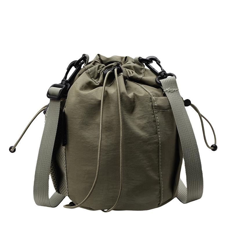 2025 New Japanese Leisure Niche Outdoor Sports Drawstring Bucket Bag Fashionable Versatile Light Travel Messenger Bag