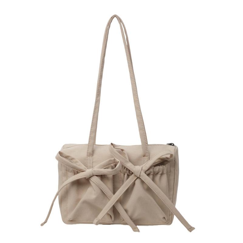 Новая сумка-тоут с бантом, высококлассная, вместительная сумка на плечо, женская простая однотонная сумка для通勤, сумка под мышкой