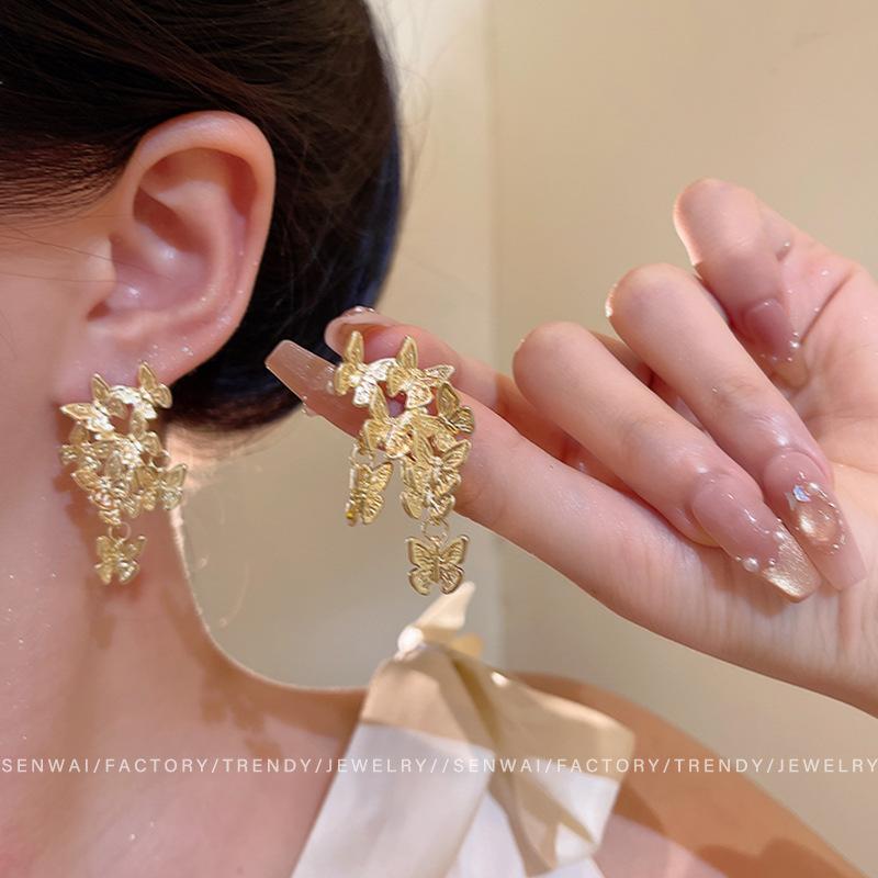 Retro gold butterfly fringed earrings women's light luxury temperament high-end stud earrings New ear jewelry