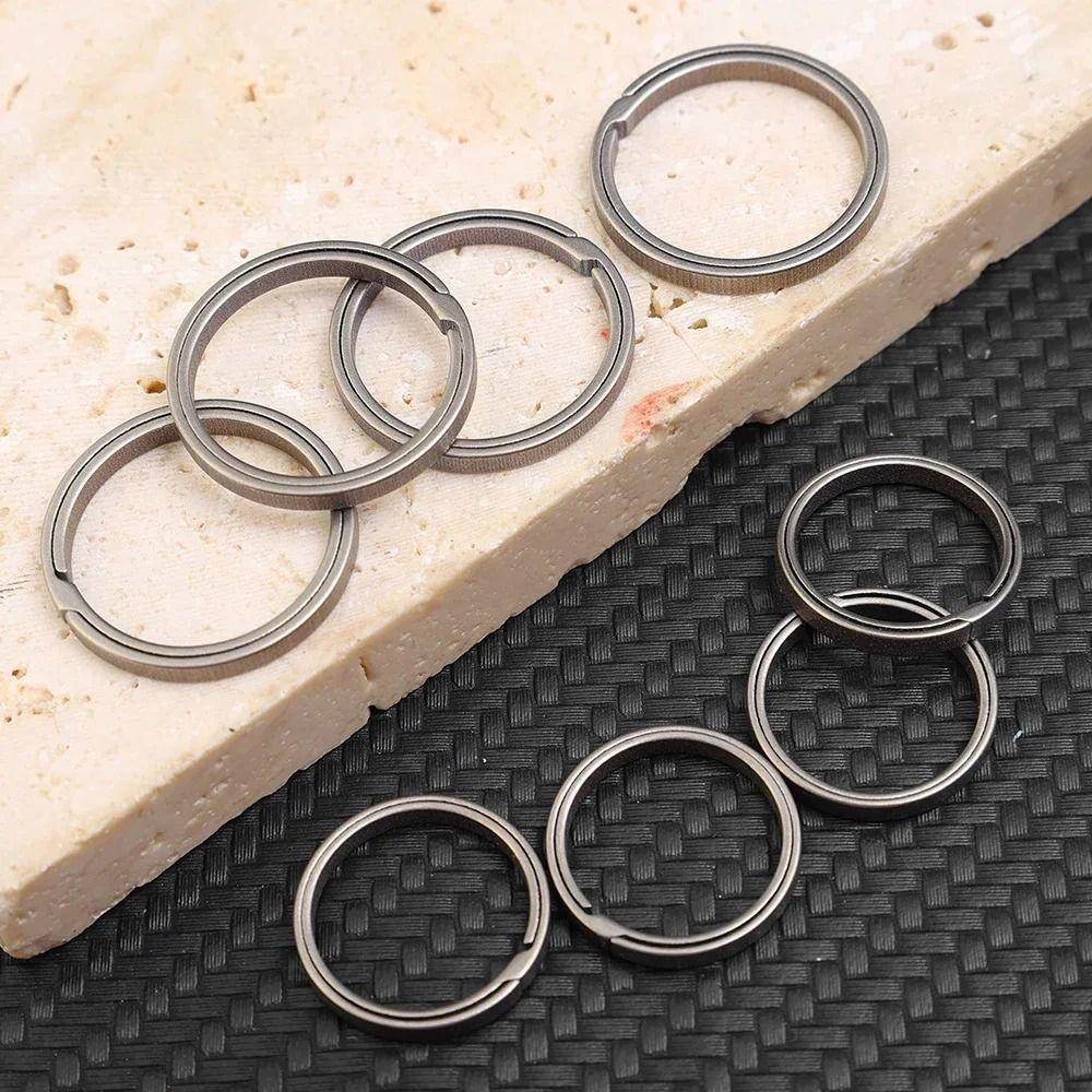 4pcs Metal Key Chain Pendant Hard Side Pushing Rings Creative Titanium Alloy Key Ring Outdoor Tools